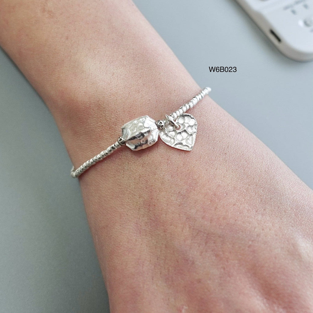 Who said luxury has to be pricey? Silver bracelet, now on sale.