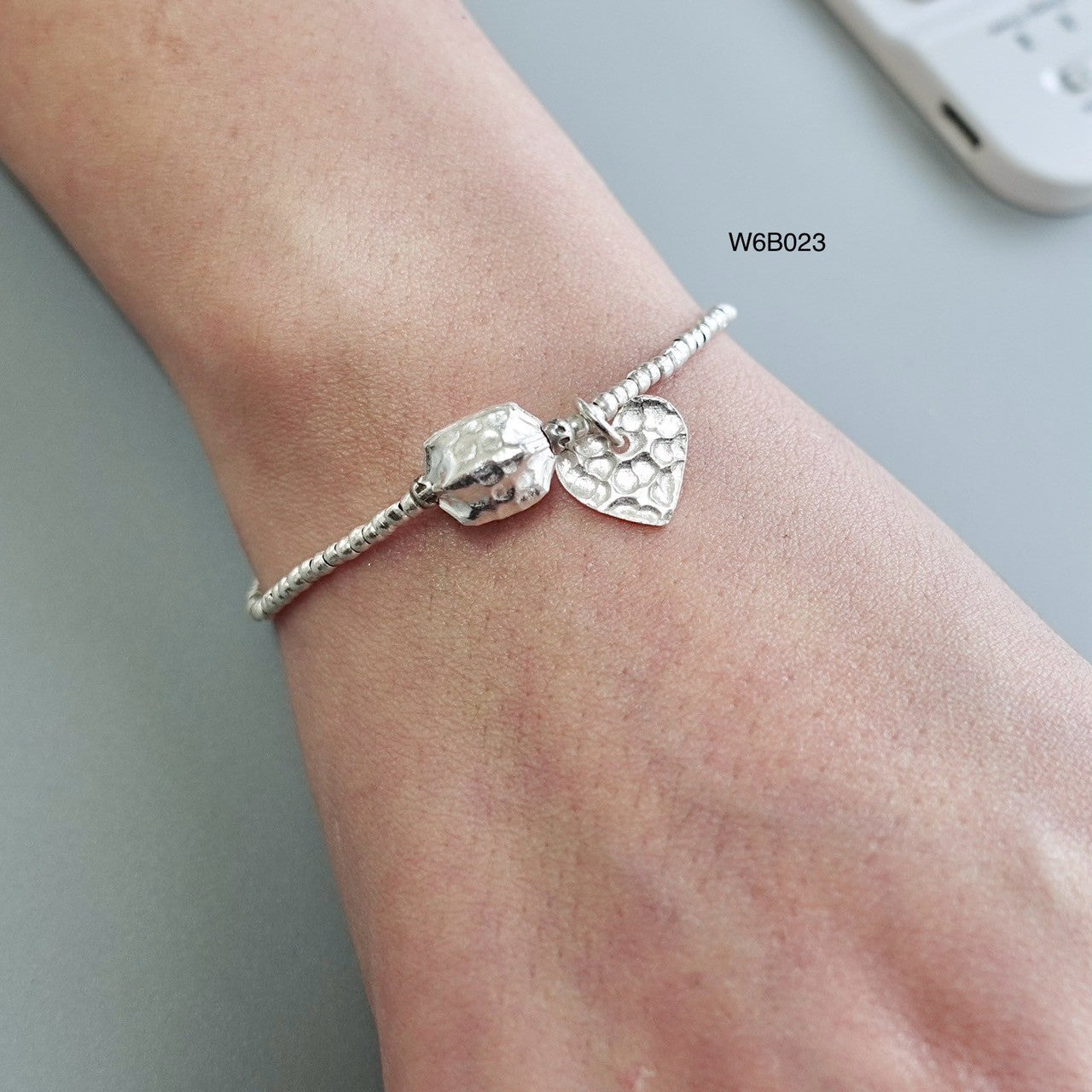 Who said luxury has to be pricey? Silver bracelet, now on sale.