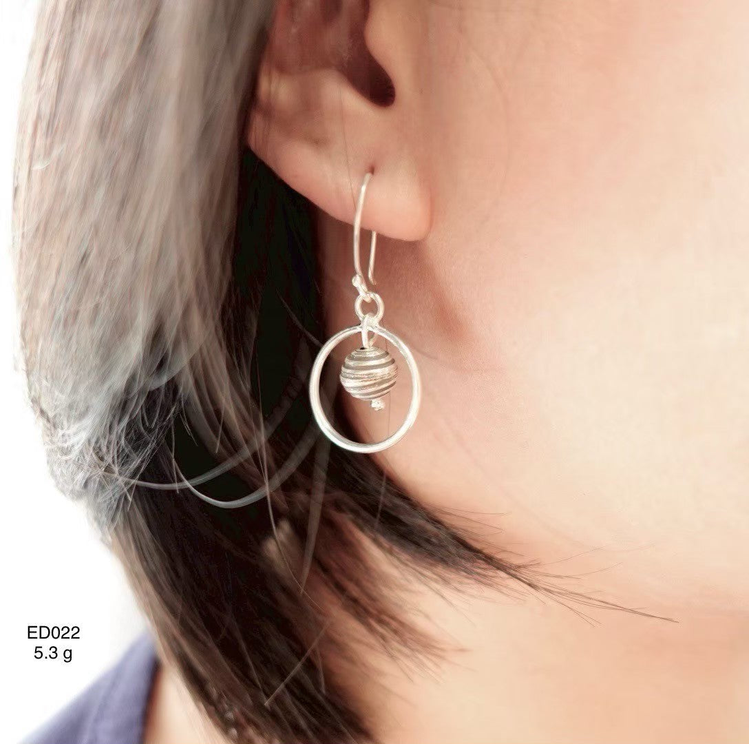 Silver earrings. Elegance in every gleam.