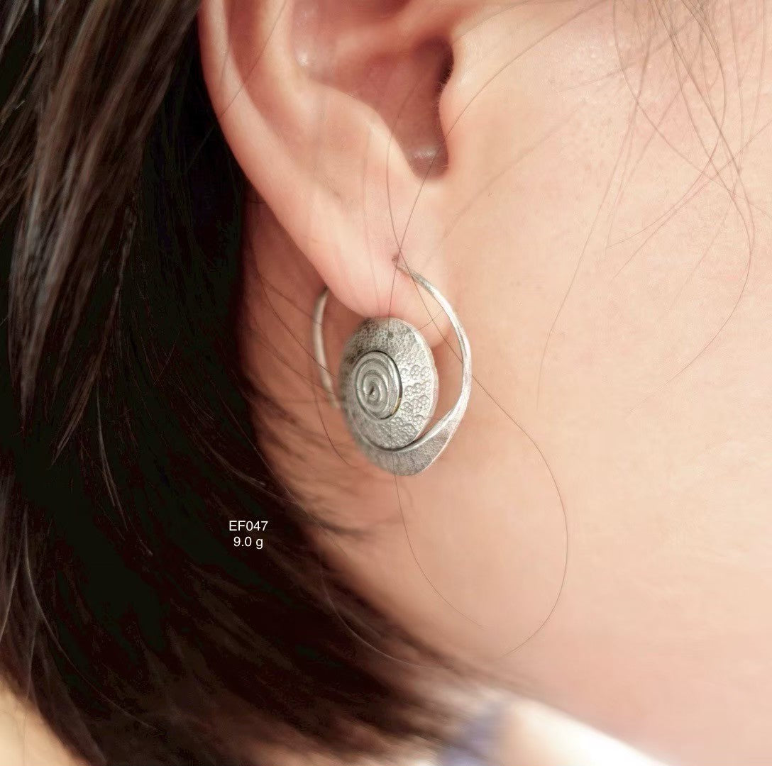 Always in style. Wear silver earrings.