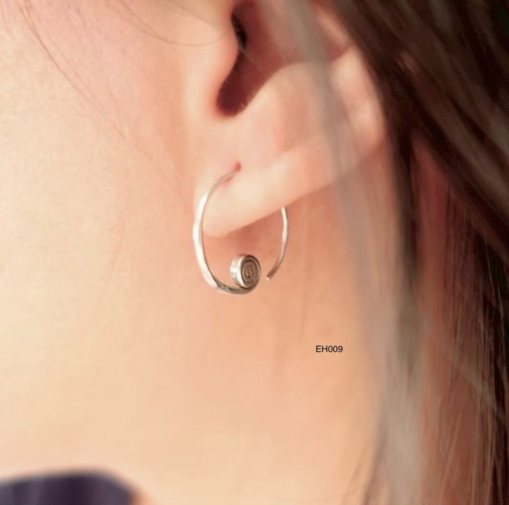 Shine bright. Wear pure. Earrings.