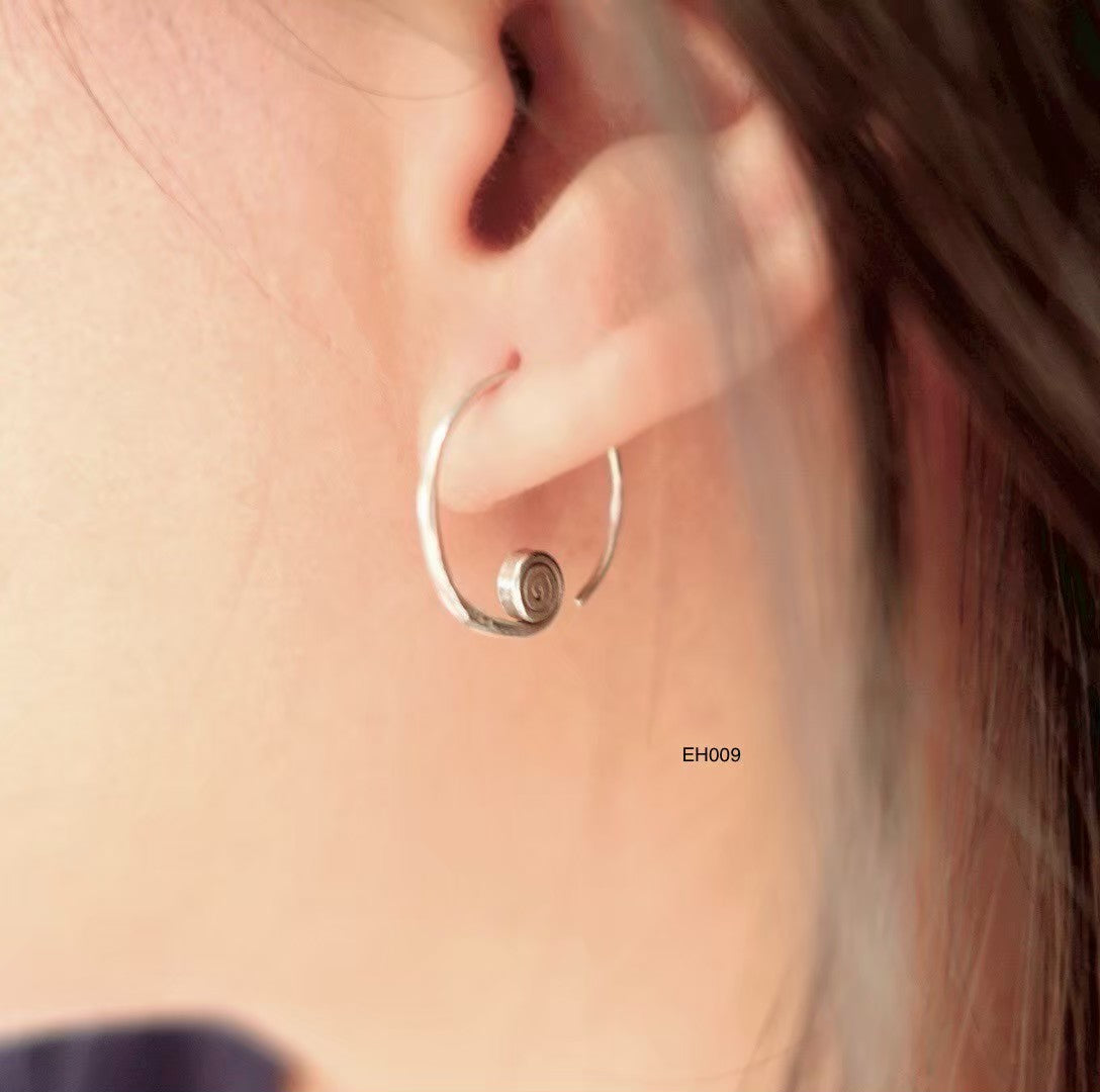 Shine bright. Wear pure. Earrings.