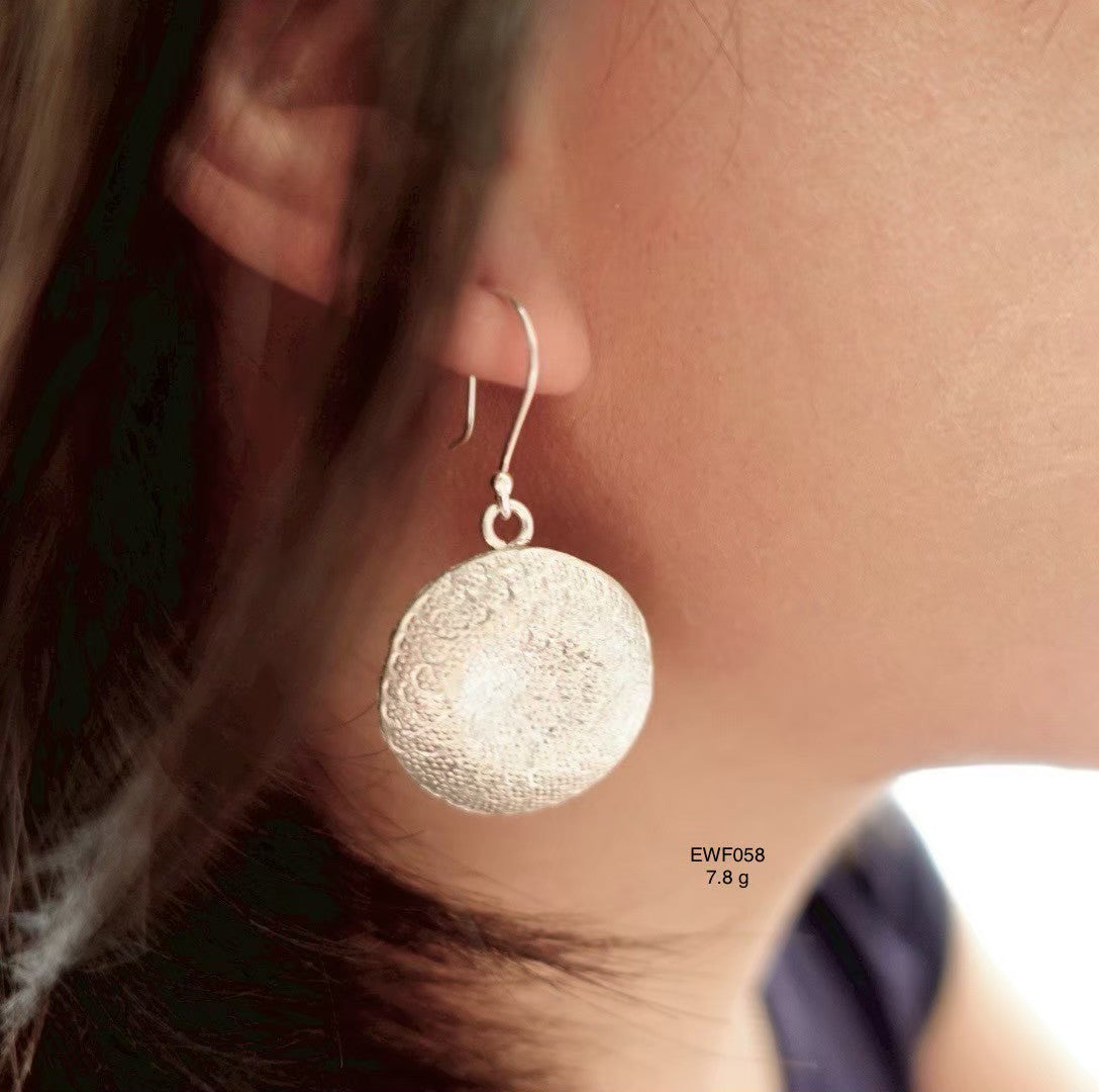 Crafted with care. Handmade silver earrings.