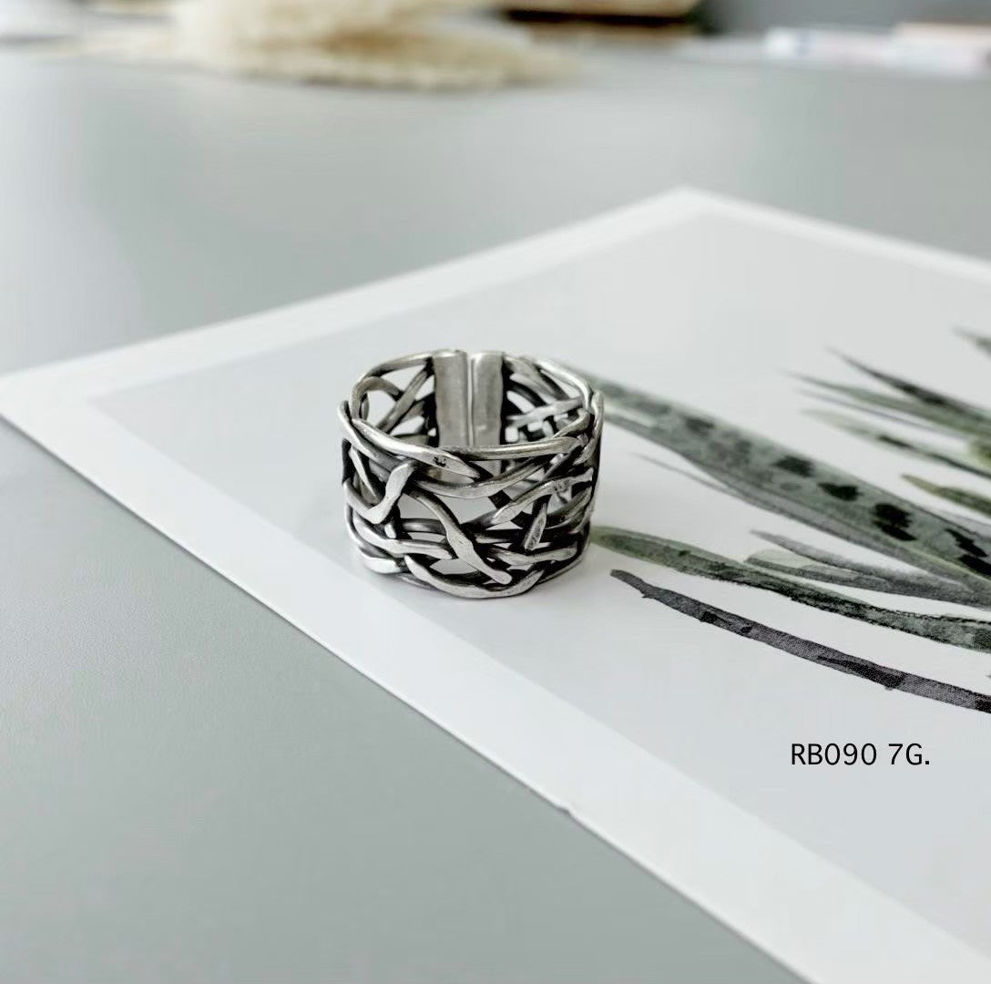 Silver ring. Intricate beauty, echoing mountain traditions.