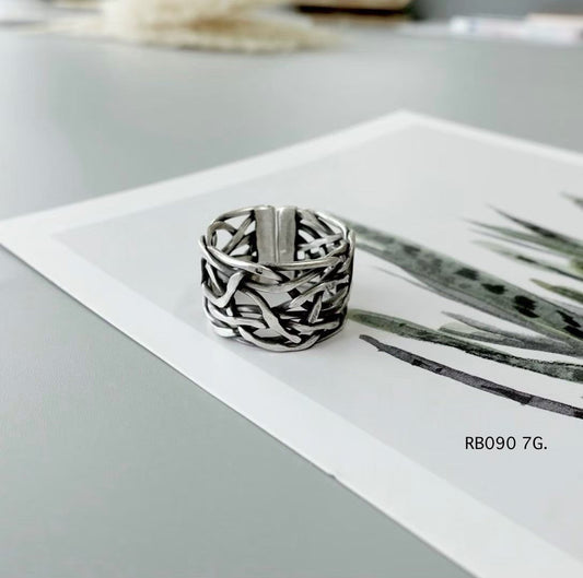 Silver ring. Intricate beauty, echoing mountain traditions.