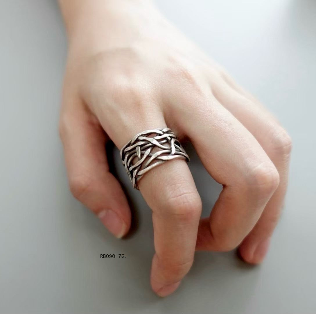 Silver ring. Intricate beauty, echoing mountain traditions.