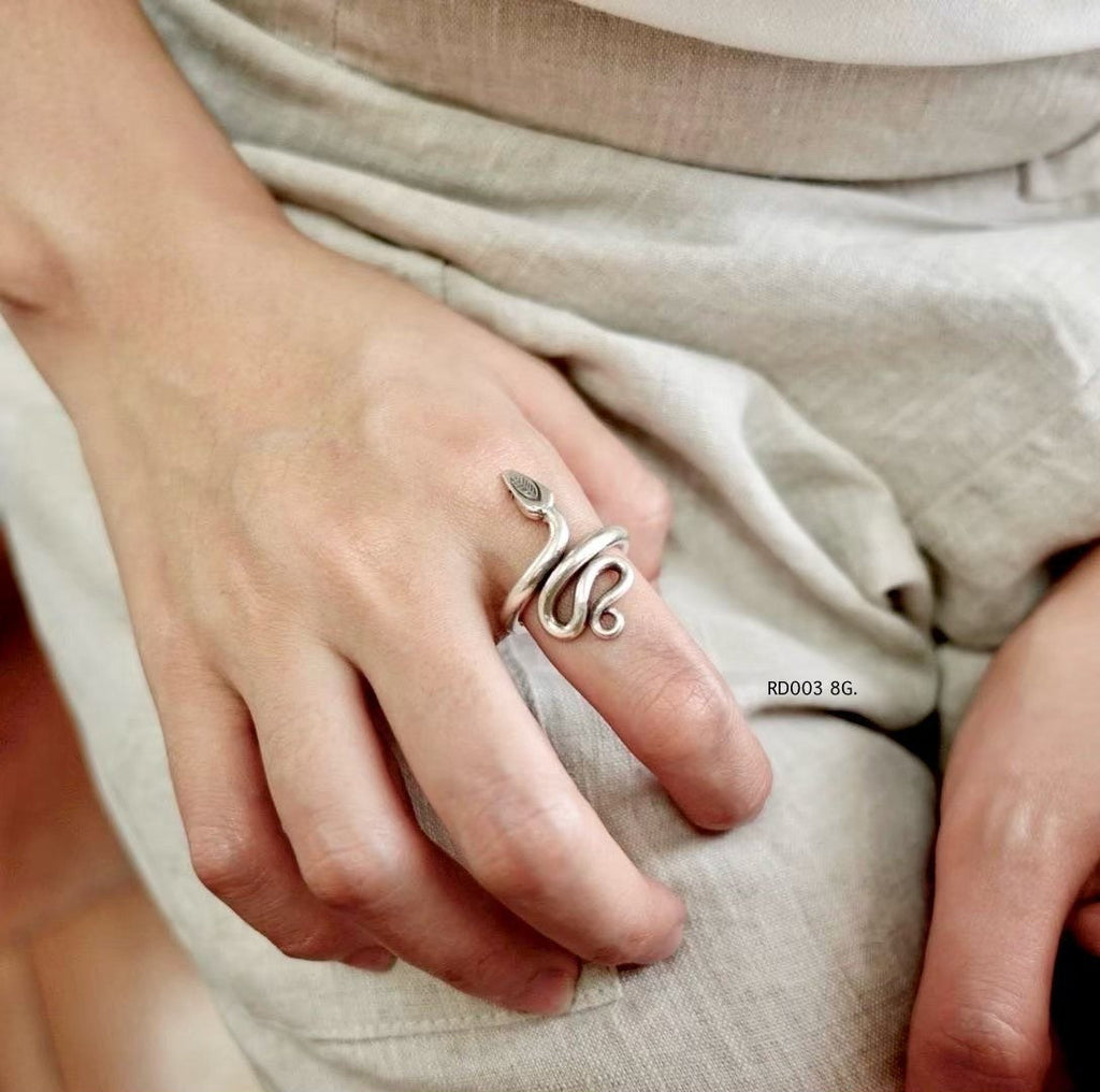 Echoes of tradition in pure silver ring.