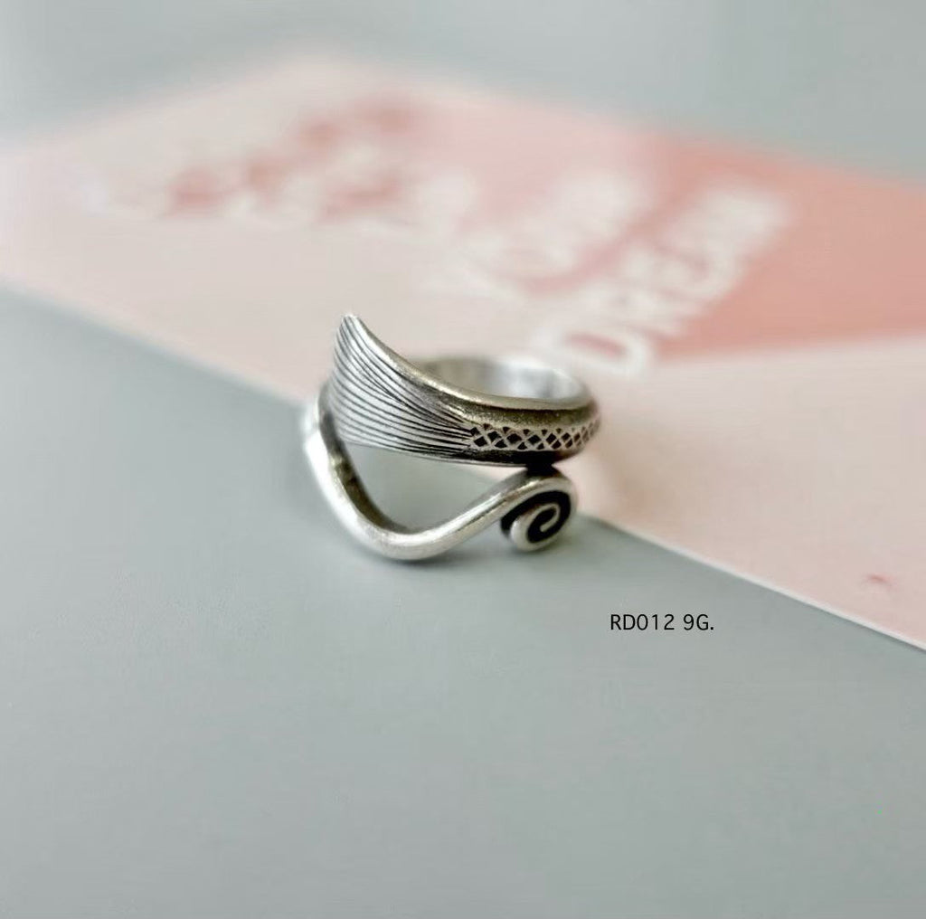Silver ring. Rustic elegance in every curve.