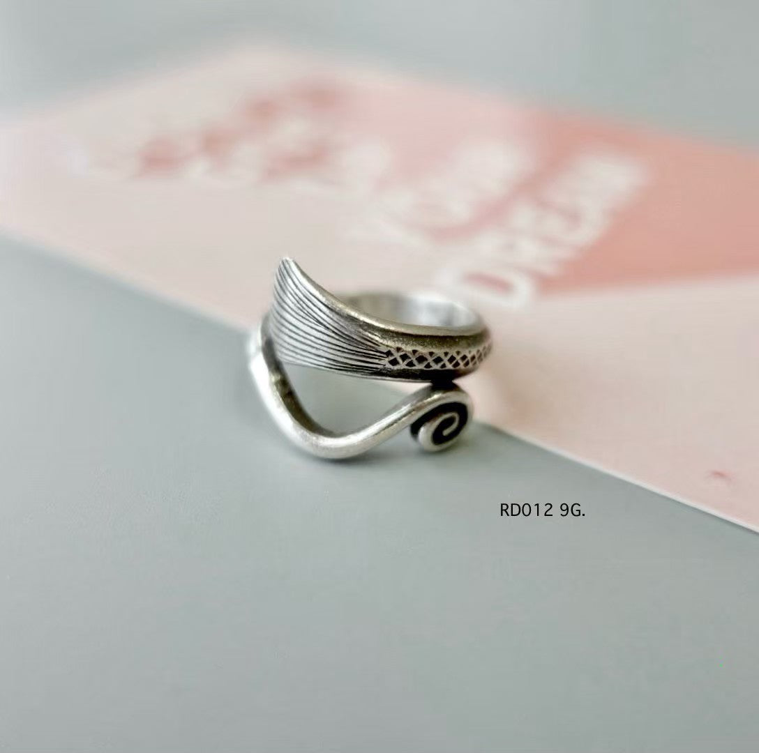 Silver ring. Rustic elegance in every curve.