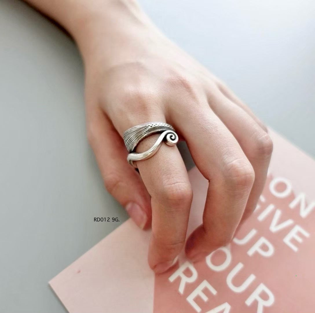 Silver ring. Rustic elegance in every curve.