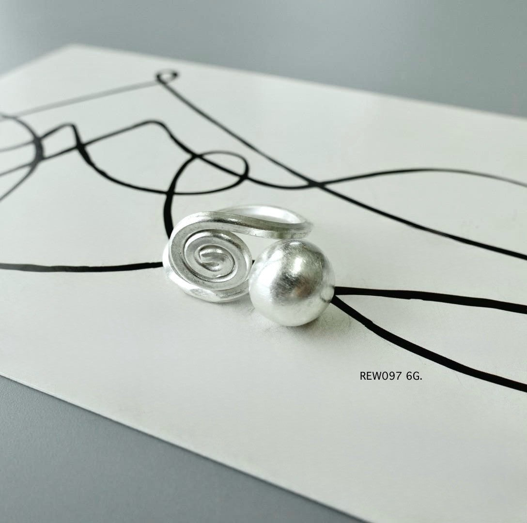 Silver ring. The hills speak in silver.