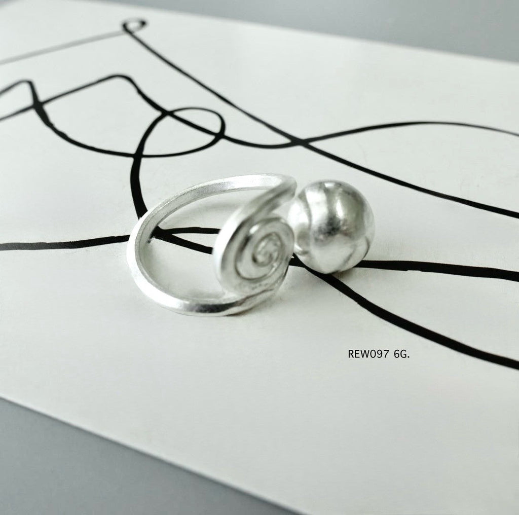 Silver ring. The hills speak in silver.