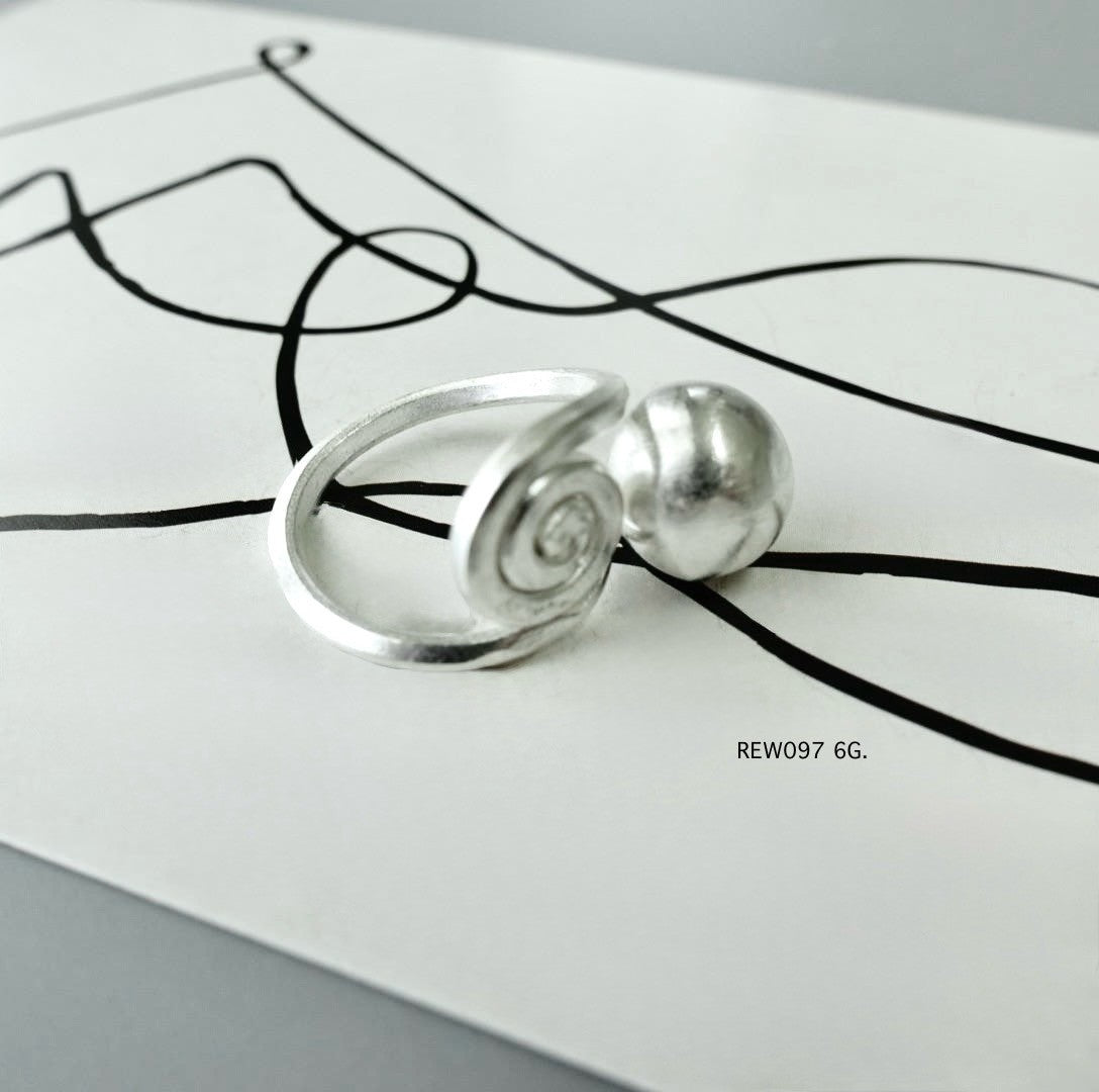 Silver ring. The hills speak in silver.