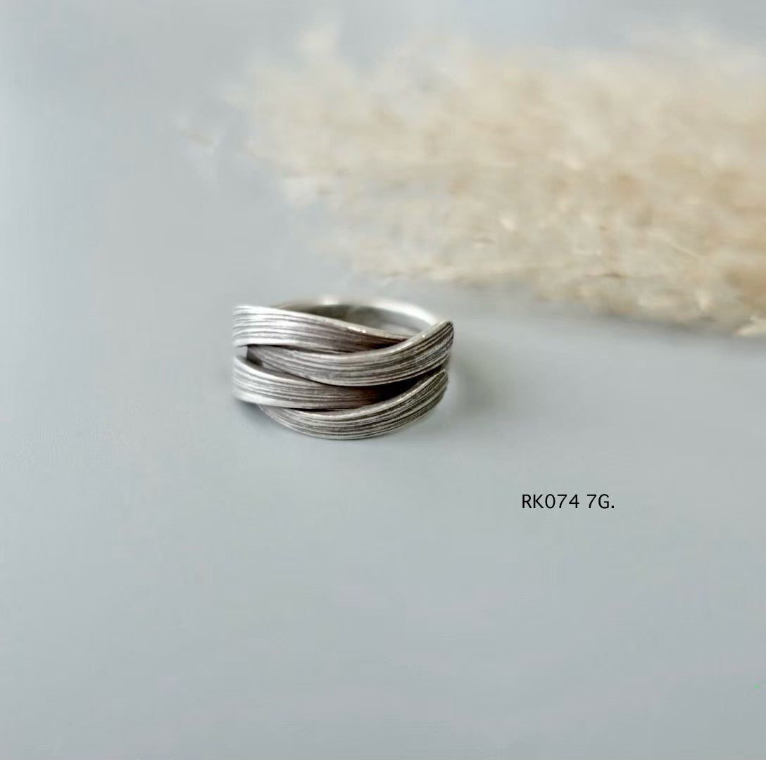 Slver ring. Echoes of the mountains in every curve.