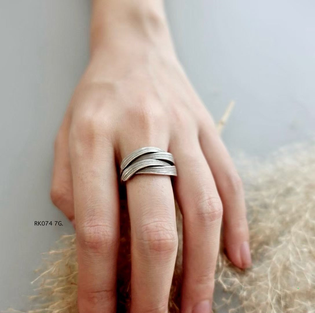 Slver ring. Echoes of the mountains in every curve.