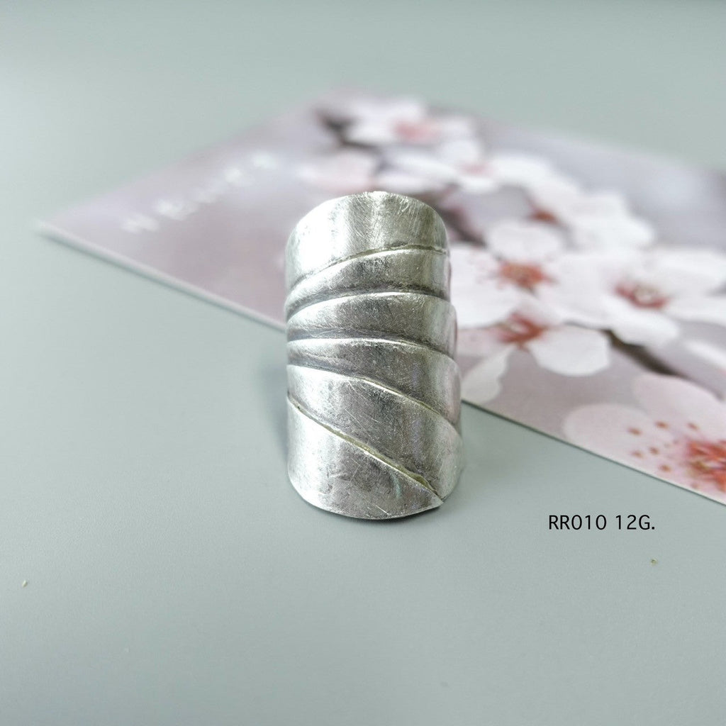 Silver ring. Not mass-made. Just meaningful.