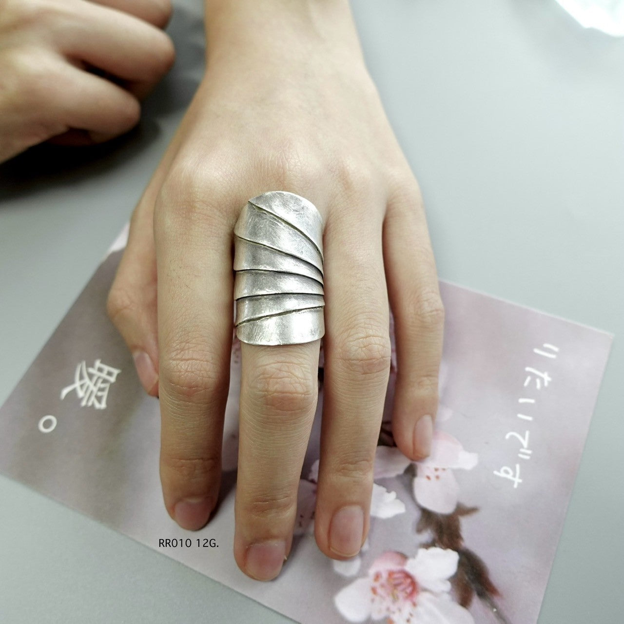 Silver ring. Not mass-made. Just meaningful.