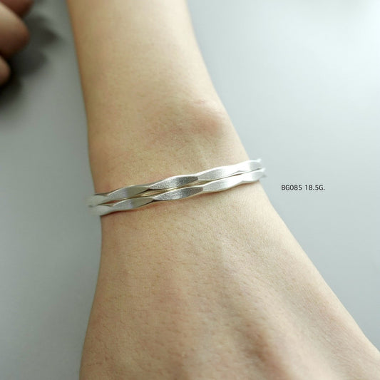 Hill tribe silver bangle. Crafted by tradition, worn with pride.