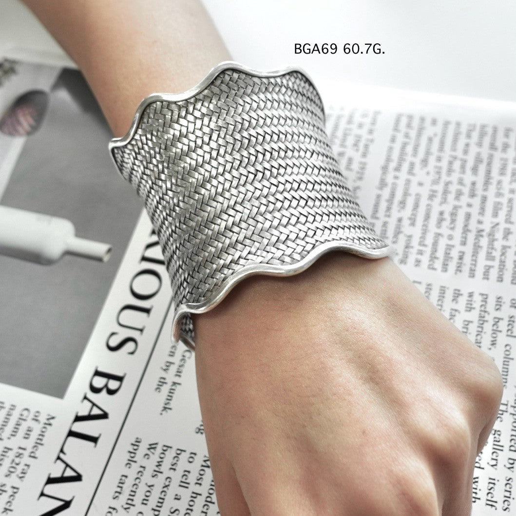 Wrap your wrist in a silver bangle.