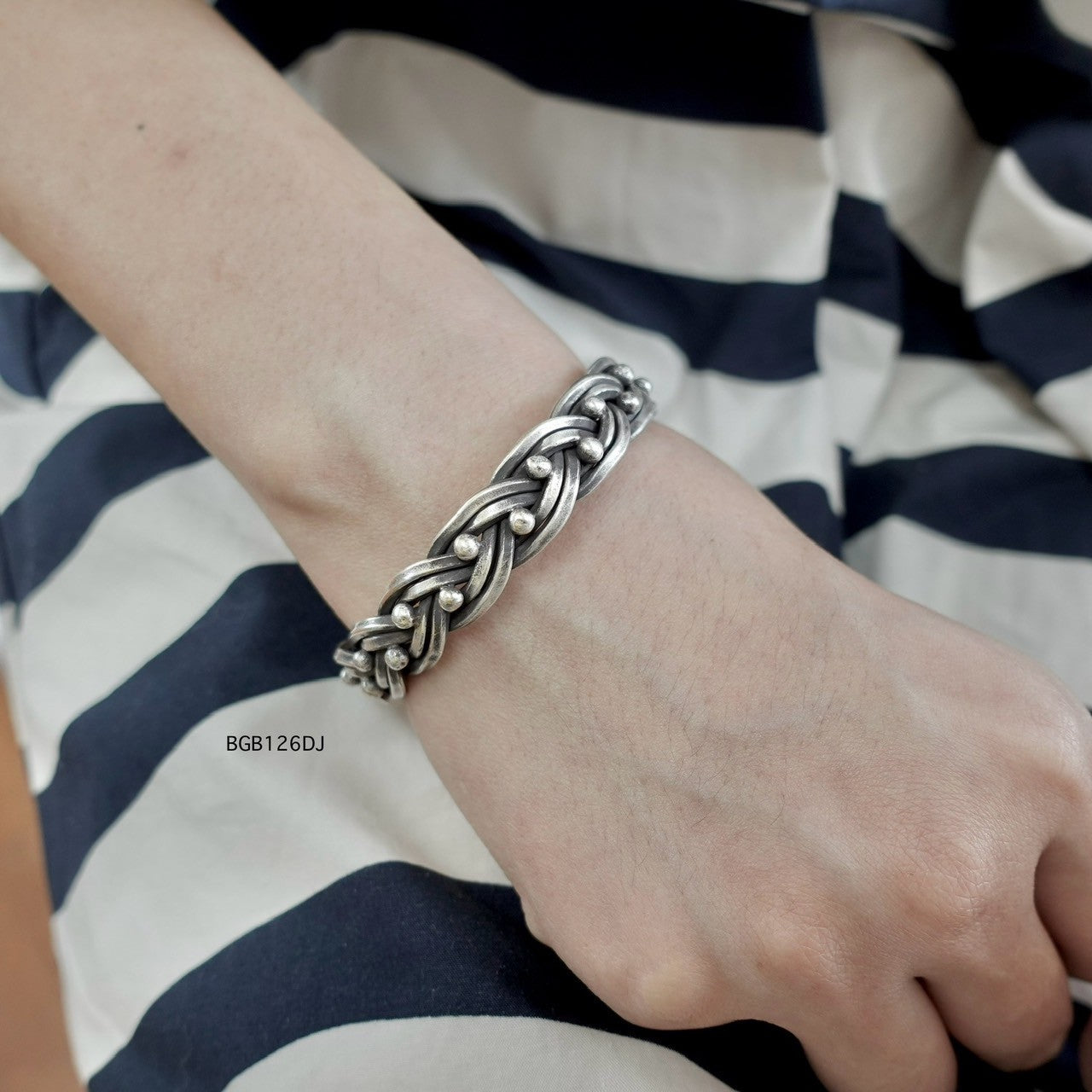 Pure silver, pure bangle beauty.