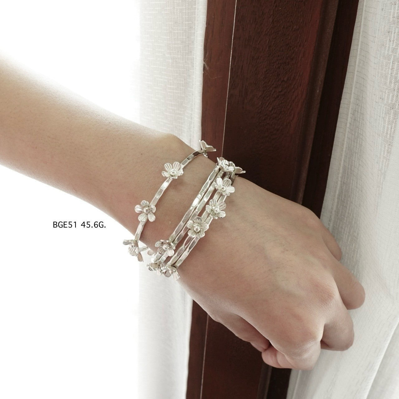 Silver bangle. Silver that speaks tradition.