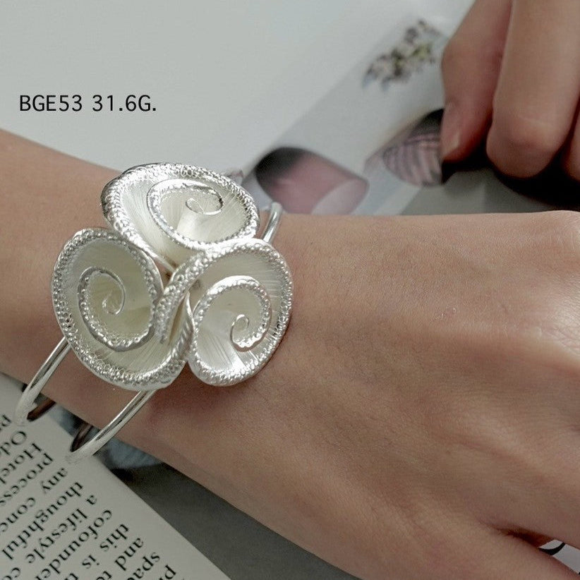 Elegance is a silver bangle away.