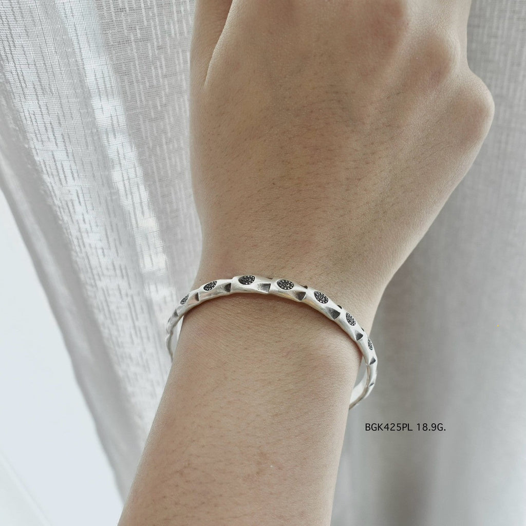 This bangle is all heart and silver.