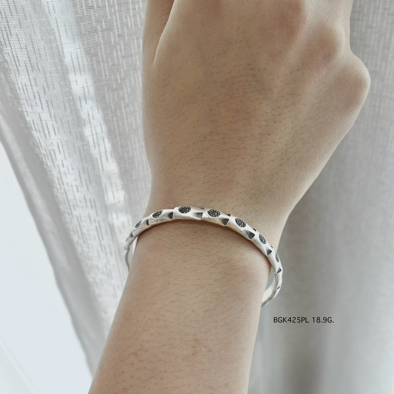 This bangle is all heart and silver.