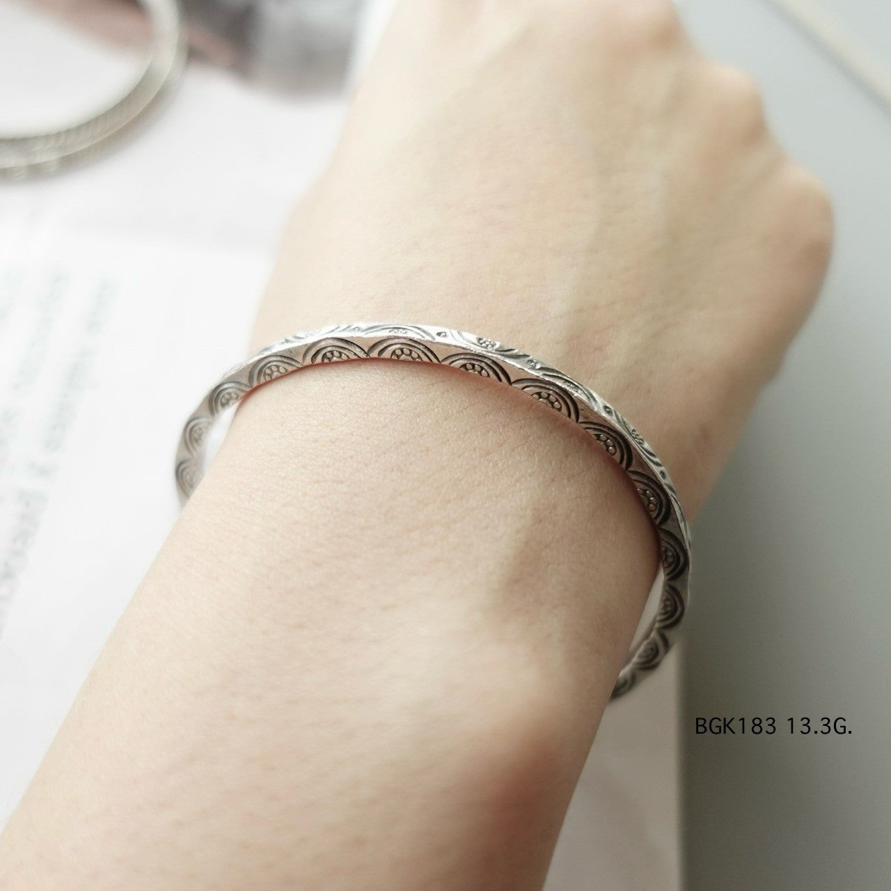 Hill tribe silver bangle. A touch of tribal grace.