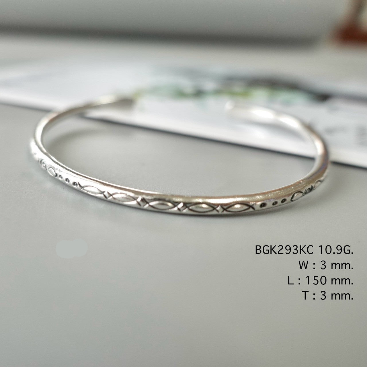 The silver bangle your soul will wear.