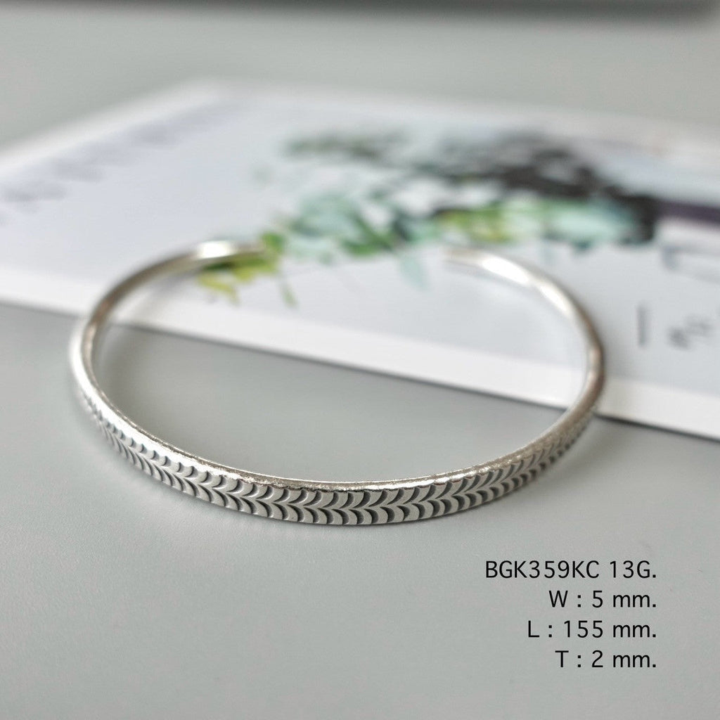 A silver bangle for your everyday sparkle.