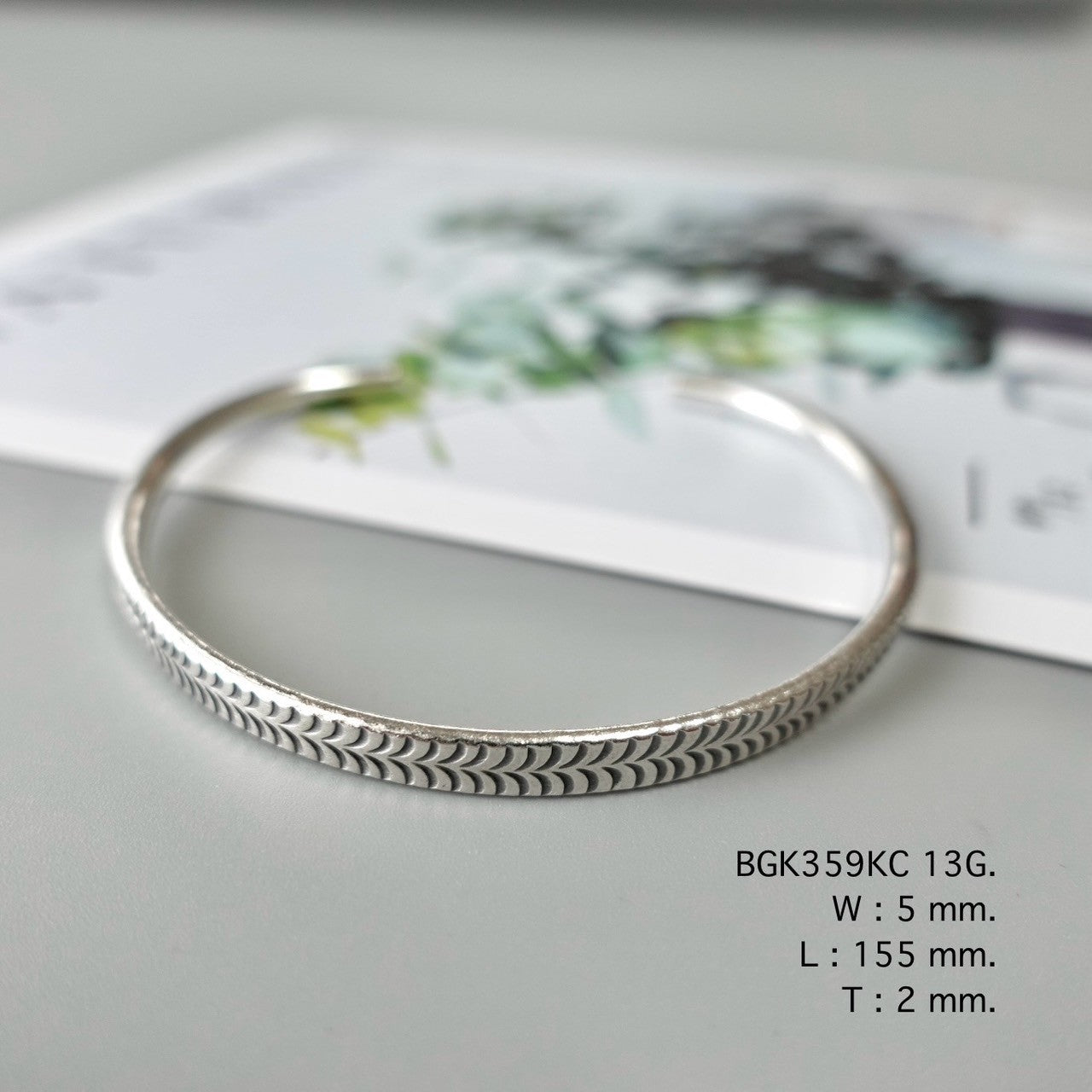 A silver bangle for your everyday sparkle.