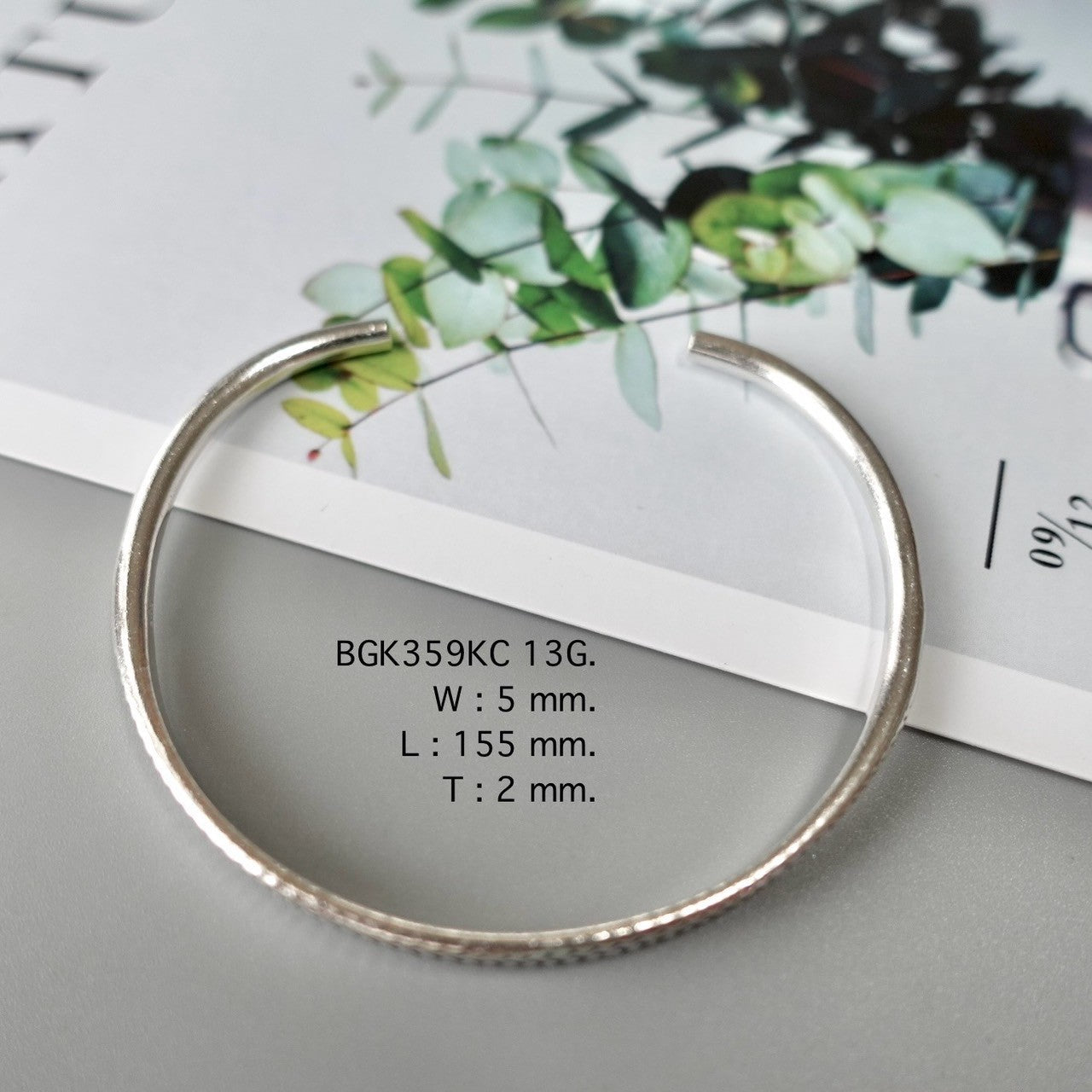 A silver bangle for your everyday sparkle.