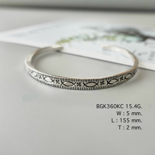 Wear your story in a silver bangle.