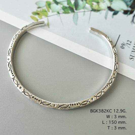 Light on the wrist, rich in charm — bangle.