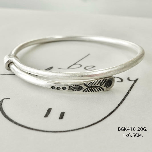 Silver bangle. Wander wild, shine silver.
