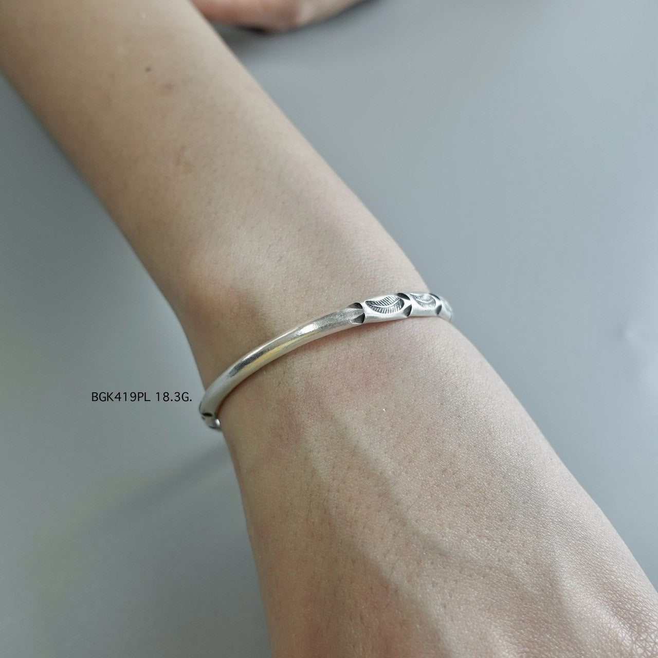 Your silver bangle, made with care.