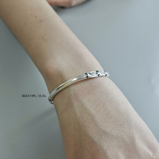 Your silver bangle, made with care.
