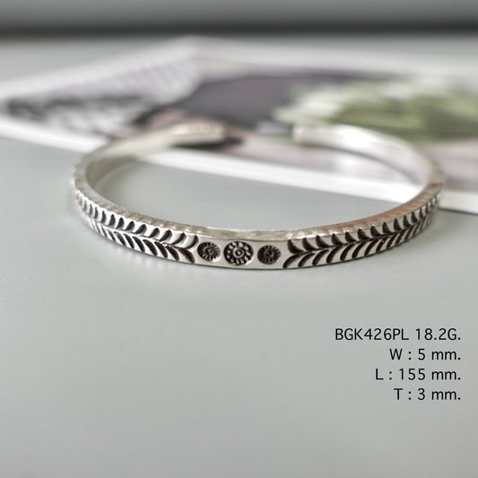 Start your stack with a handmade bangle.