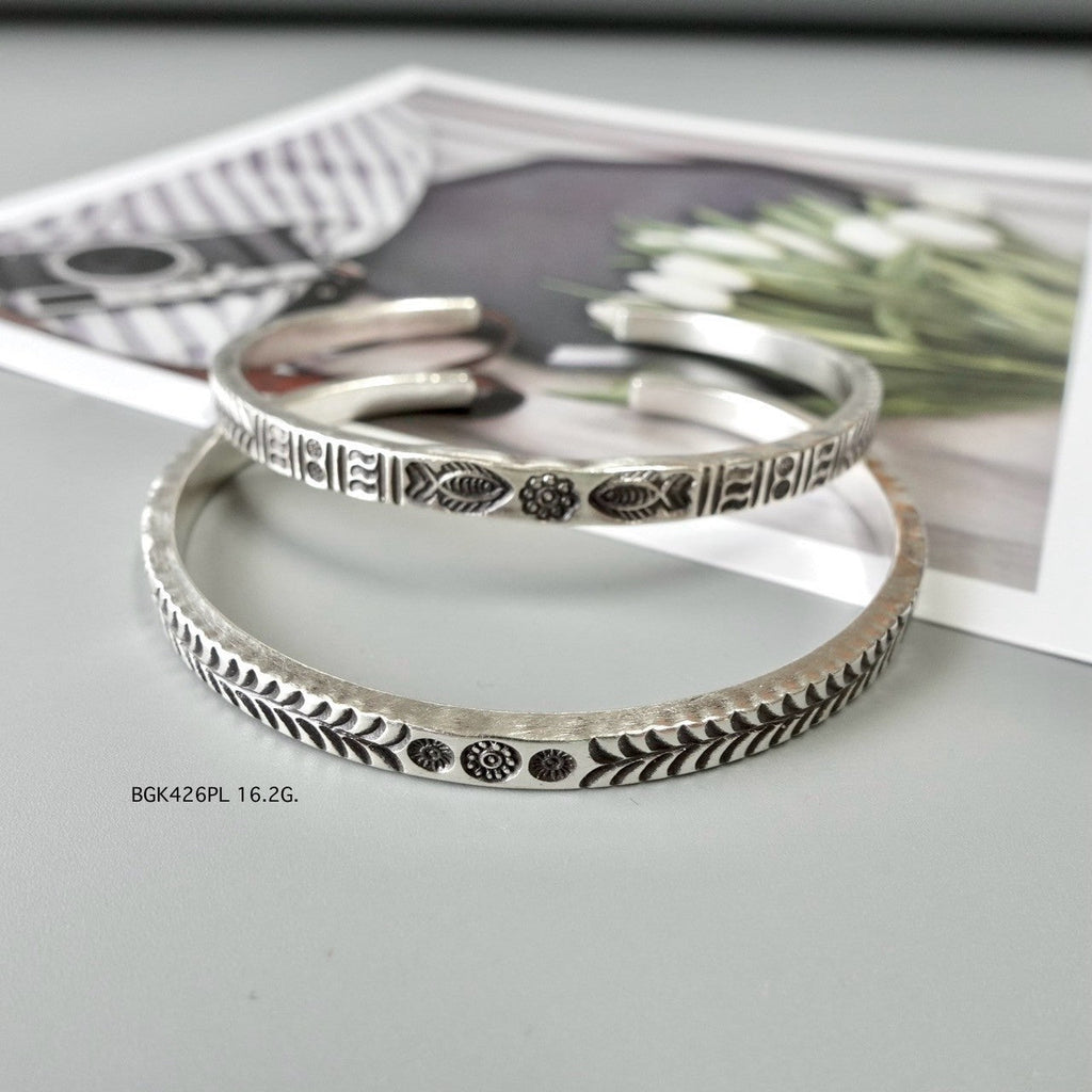 Start your stack with a handmade bangle.