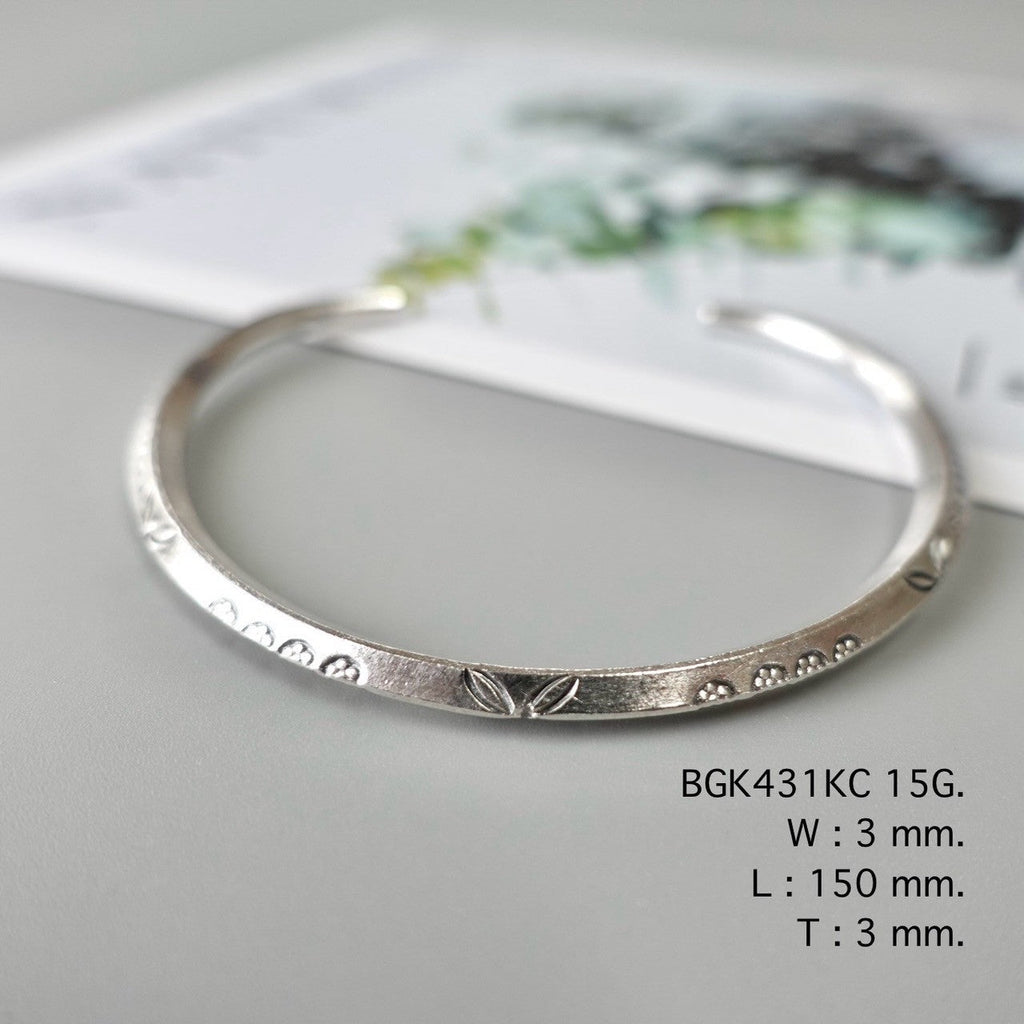 Your shine begins with this silver bangle.