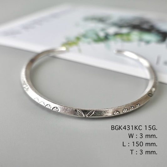 Your shine begins with this silver bangle.