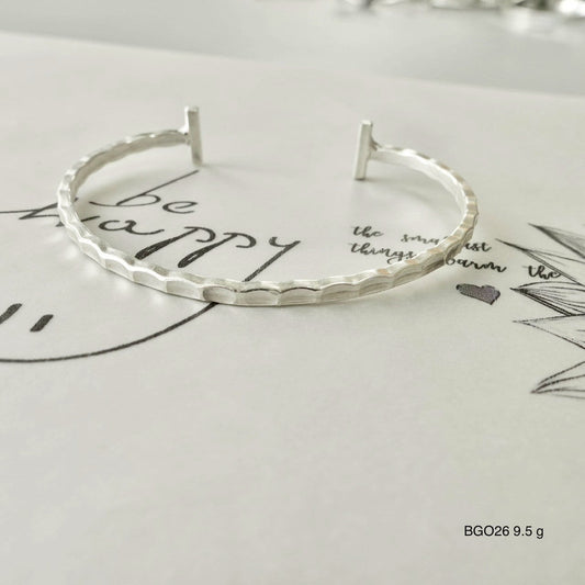 Silver bangle. Where art becomes adornment.
